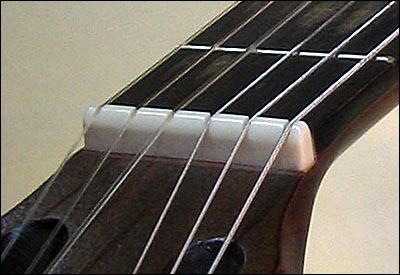 Régler le sillet de tête - Guide pédagogique et technique pour la guitare  moderne